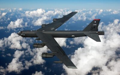 B-52 flies over clouds