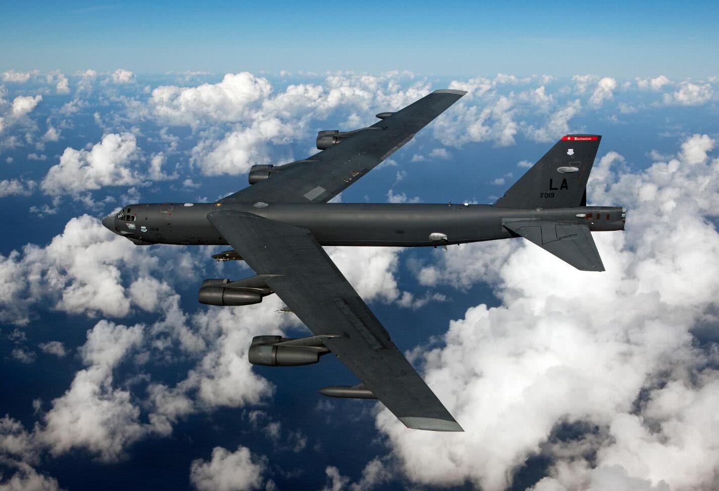 B-52 Flies Over Clouds